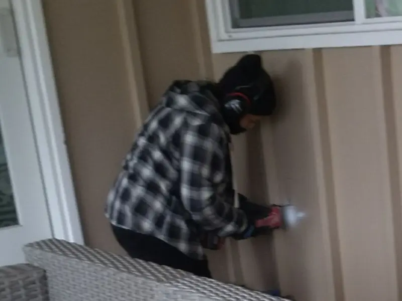 Professional electrician installing an exterior outlet in Vail